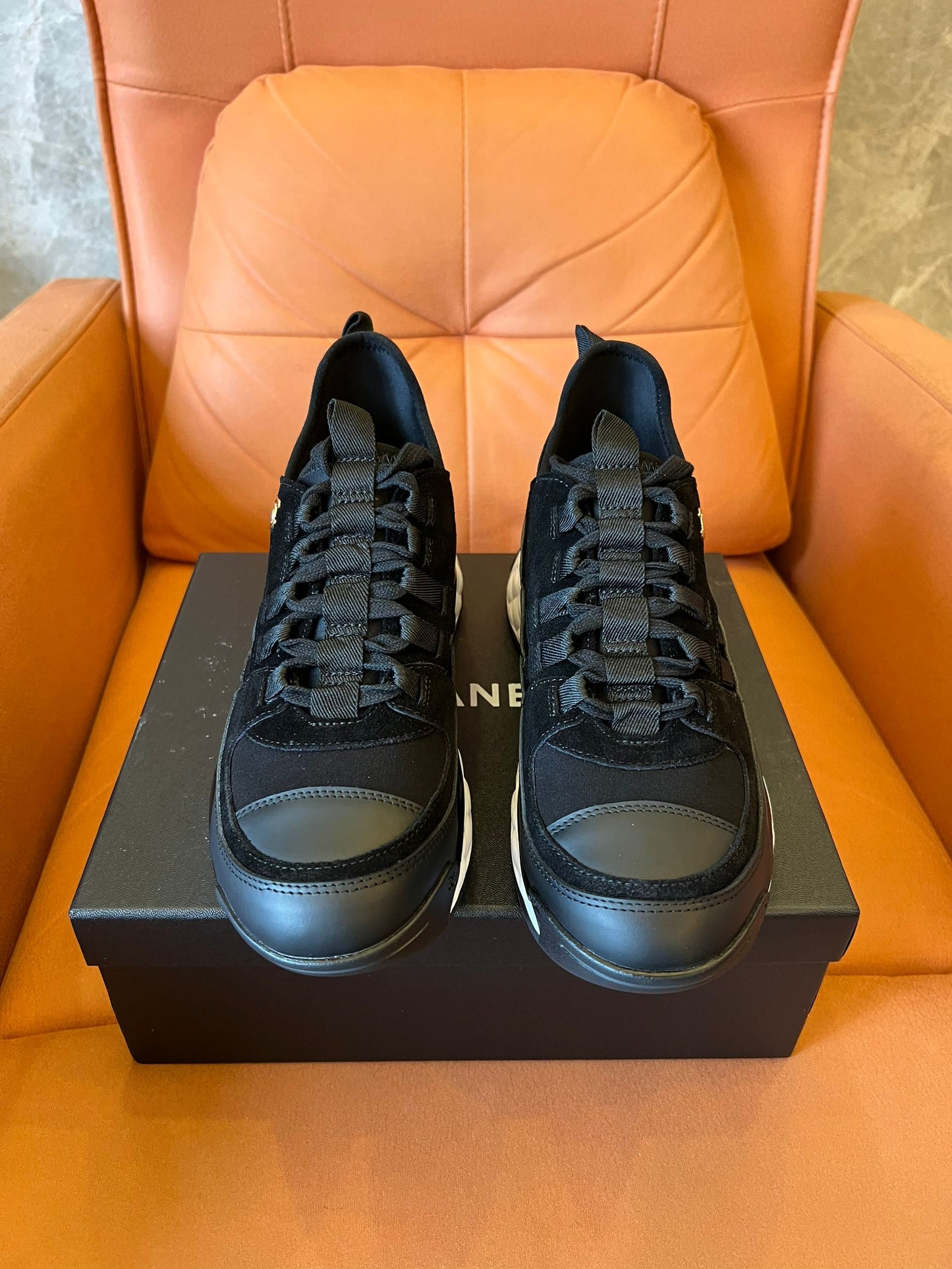 Chanel quilted sole black sneakers