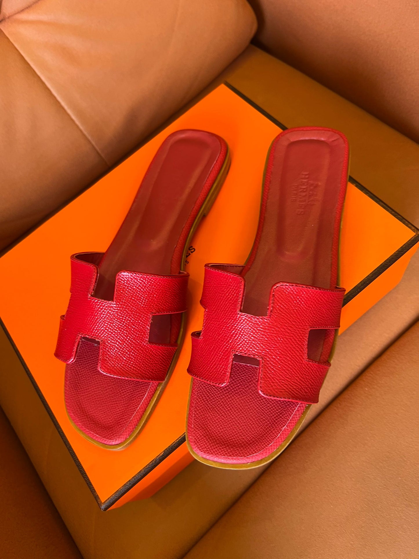 Hermès Oran slippers in rouge leather