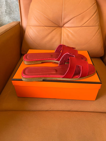 Hermès Oran slippers in rouge leather