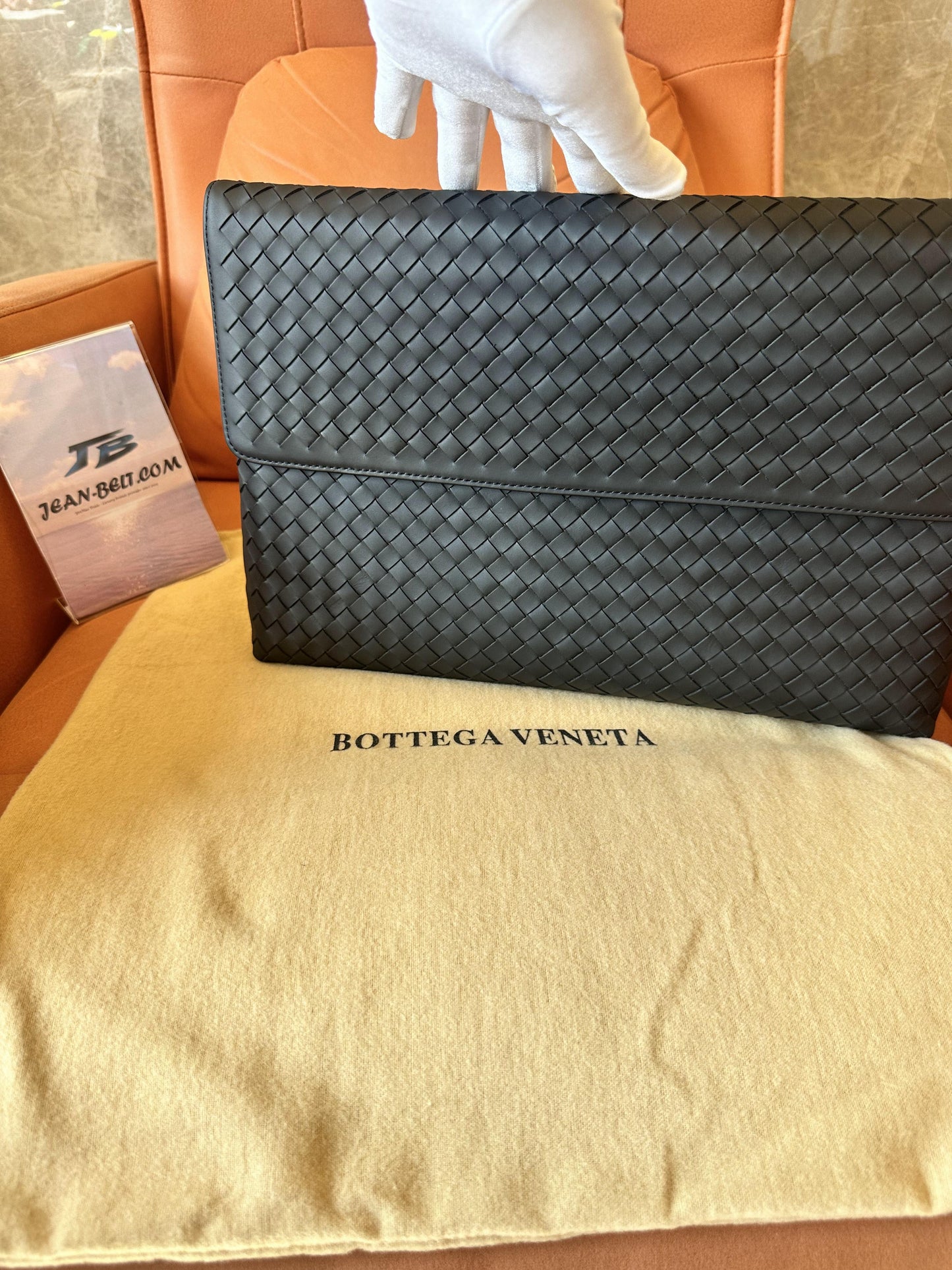 Bottega Veneta black leather mesh clutch bag