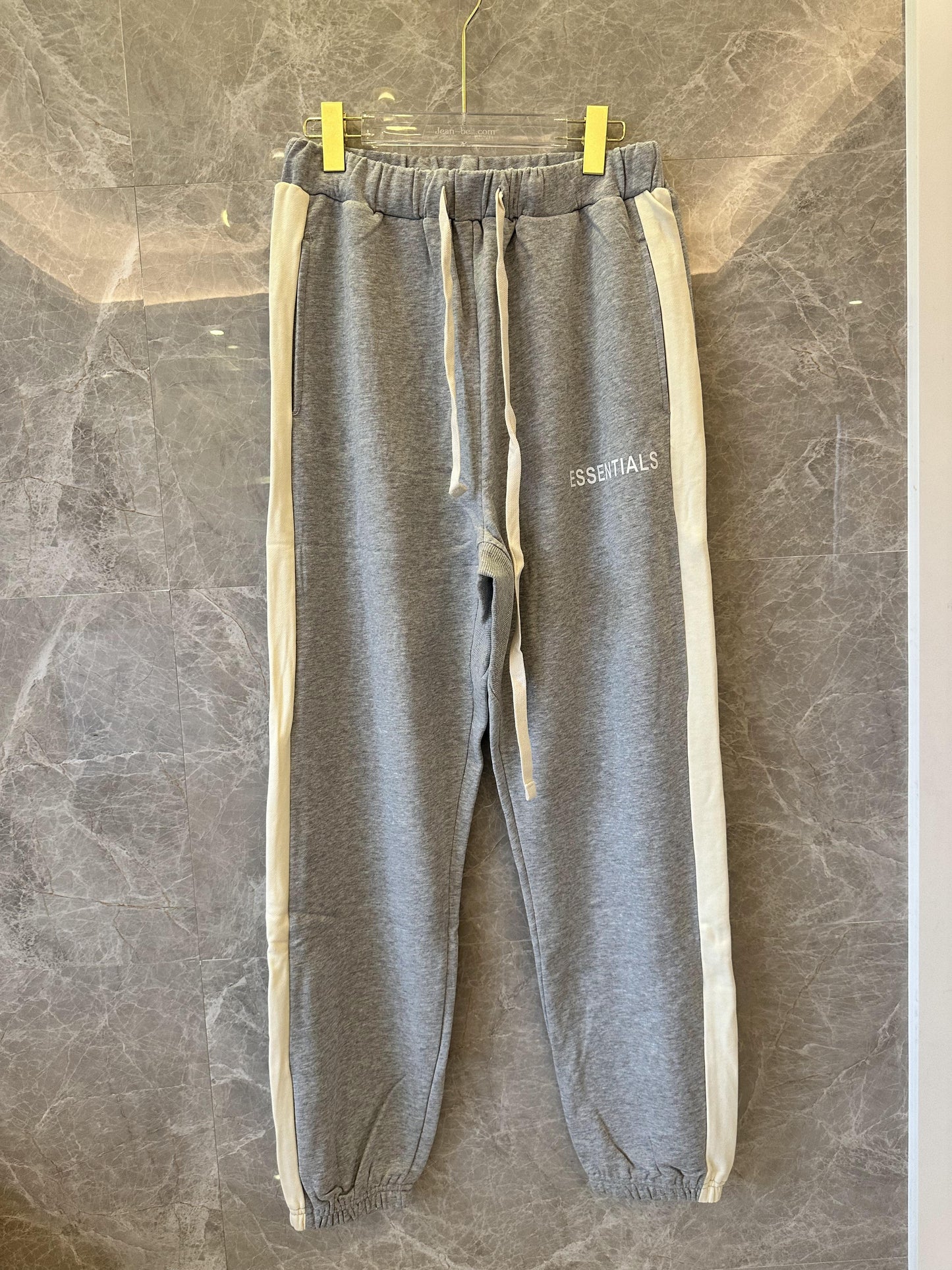 Essentials gray track pants with ivory side stripe