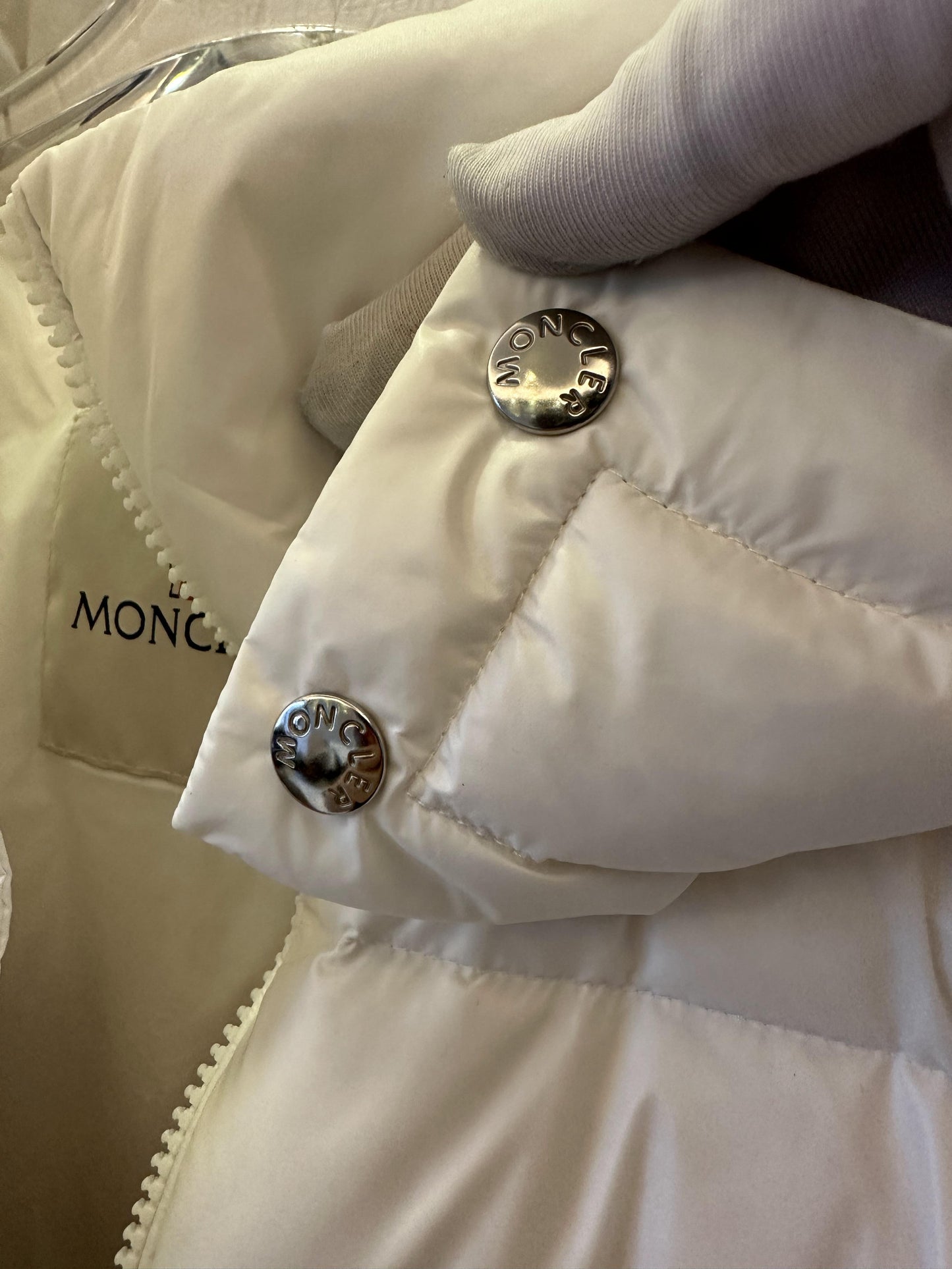 Moncler white hooded puffer jacket with black logo detail