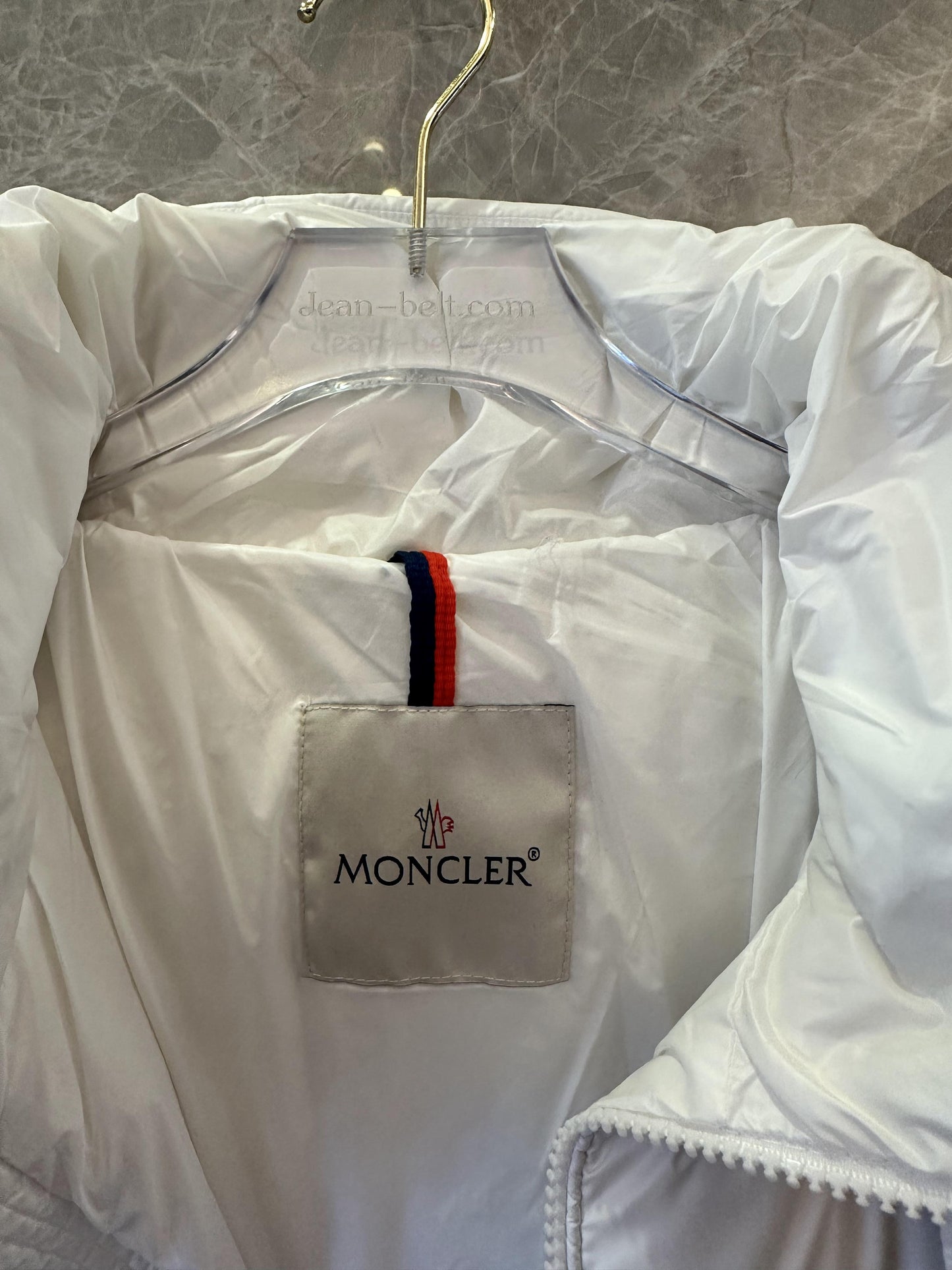 Moncler white hooded puffer jacket with black logo detail