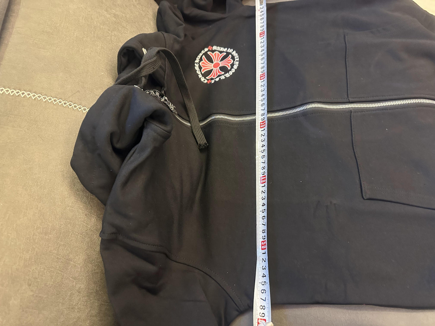 Chrome Hearts black zip-up hoodie with red cross graphics