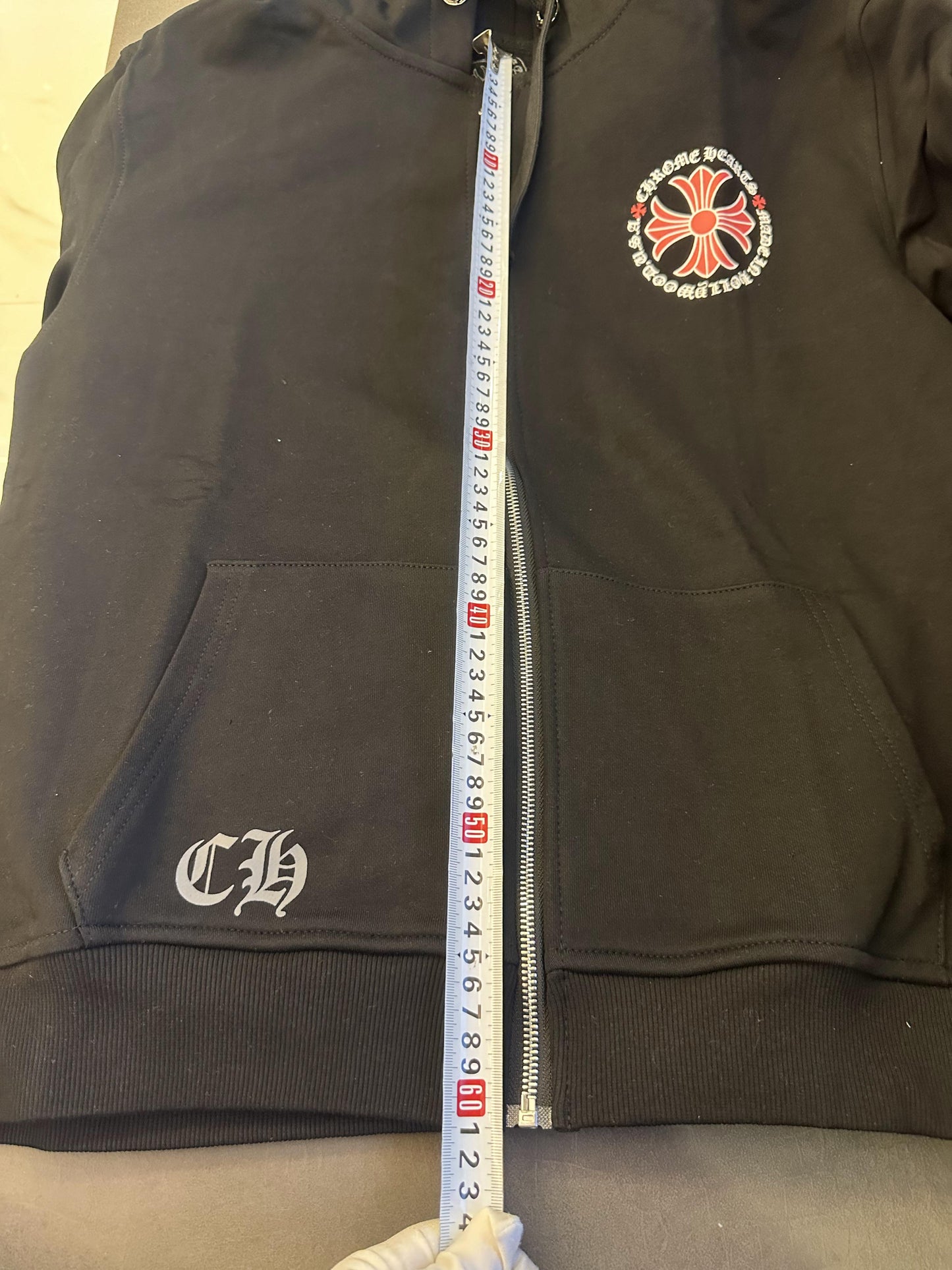 Chrome Hearts black zip-up hoodie with red cross graphics