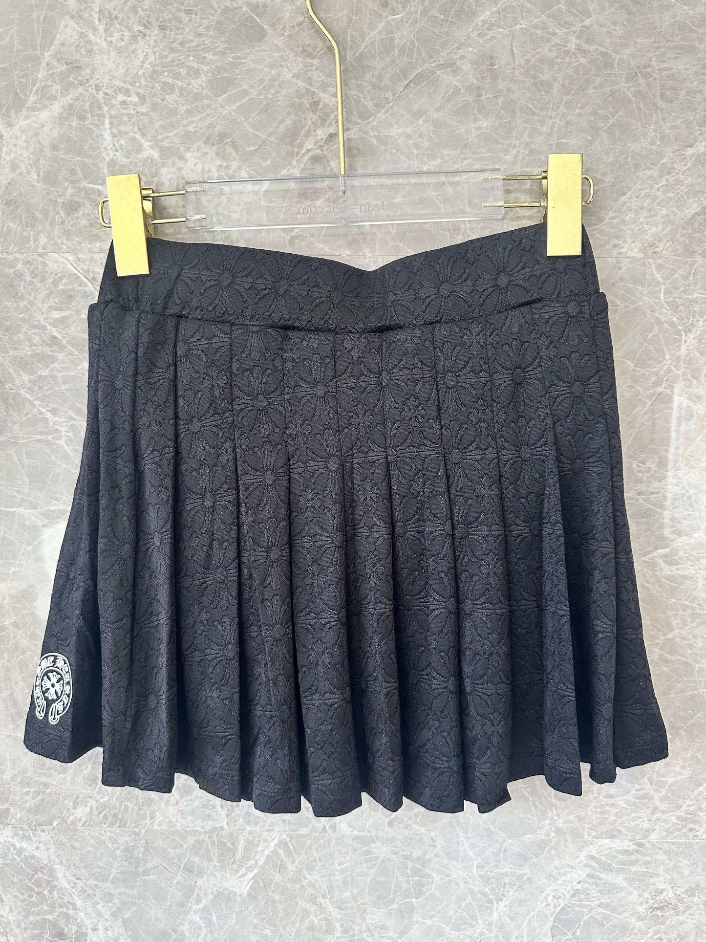 Chrome Hearts black embroidered polo crop top and pleated mini skirt set