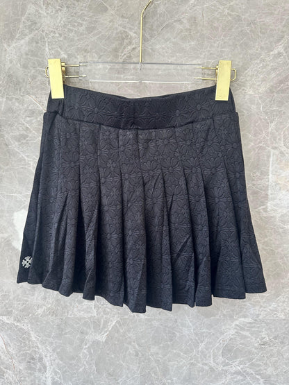 Chrome Hearts black embroidered polo crop top and pleated mini skirt set