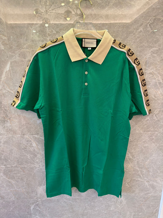 Gucci green polo shirt with signature GG tape trim