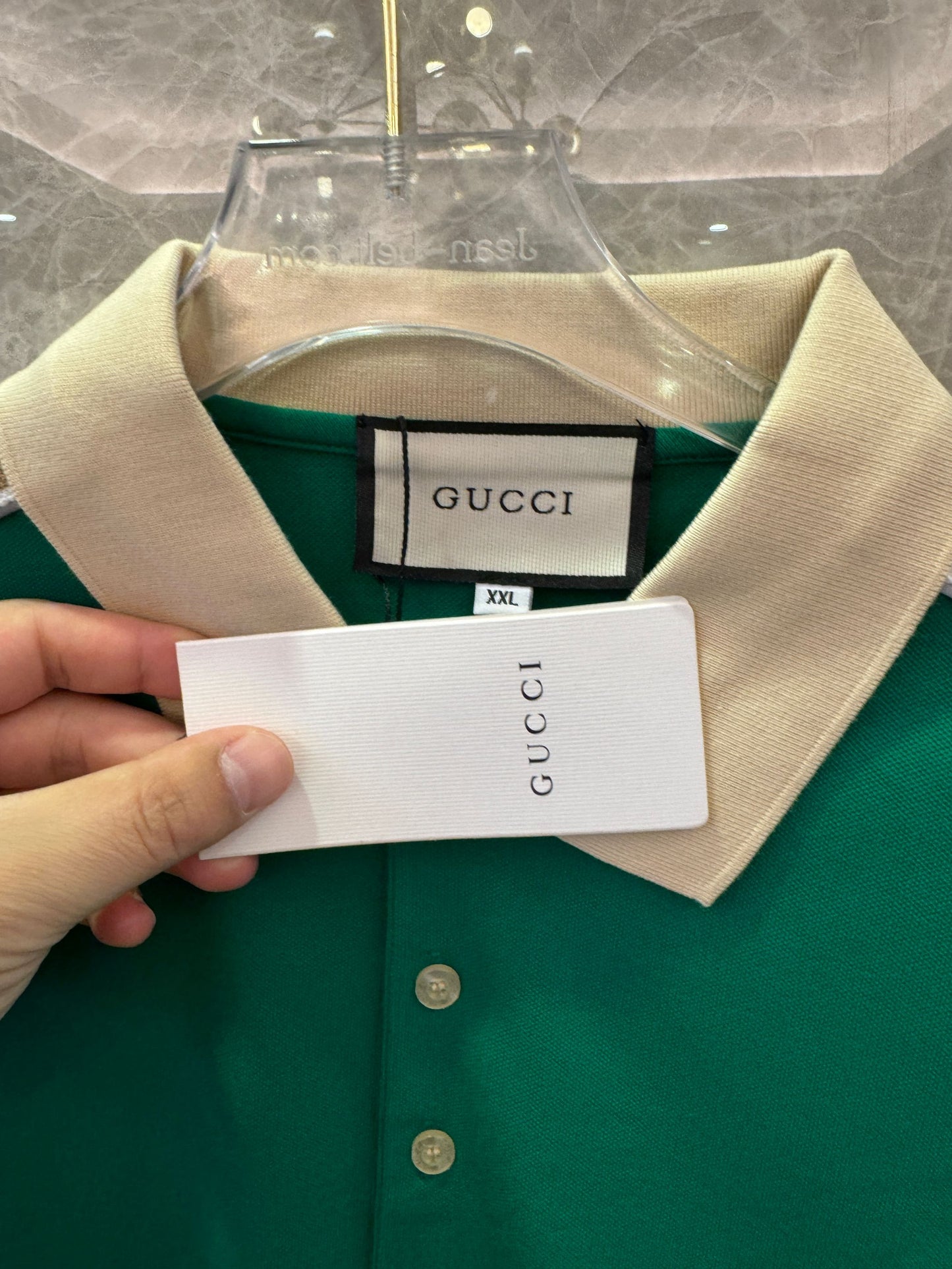 Gucci green polo shirt with signature GG tape trim