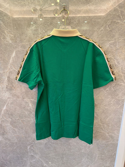 Gucci green polo shirt with signature GG tape trim