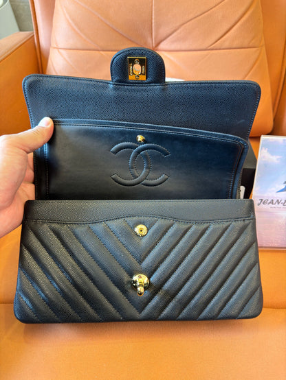 Chanel classic small black chevron caviar flap bag