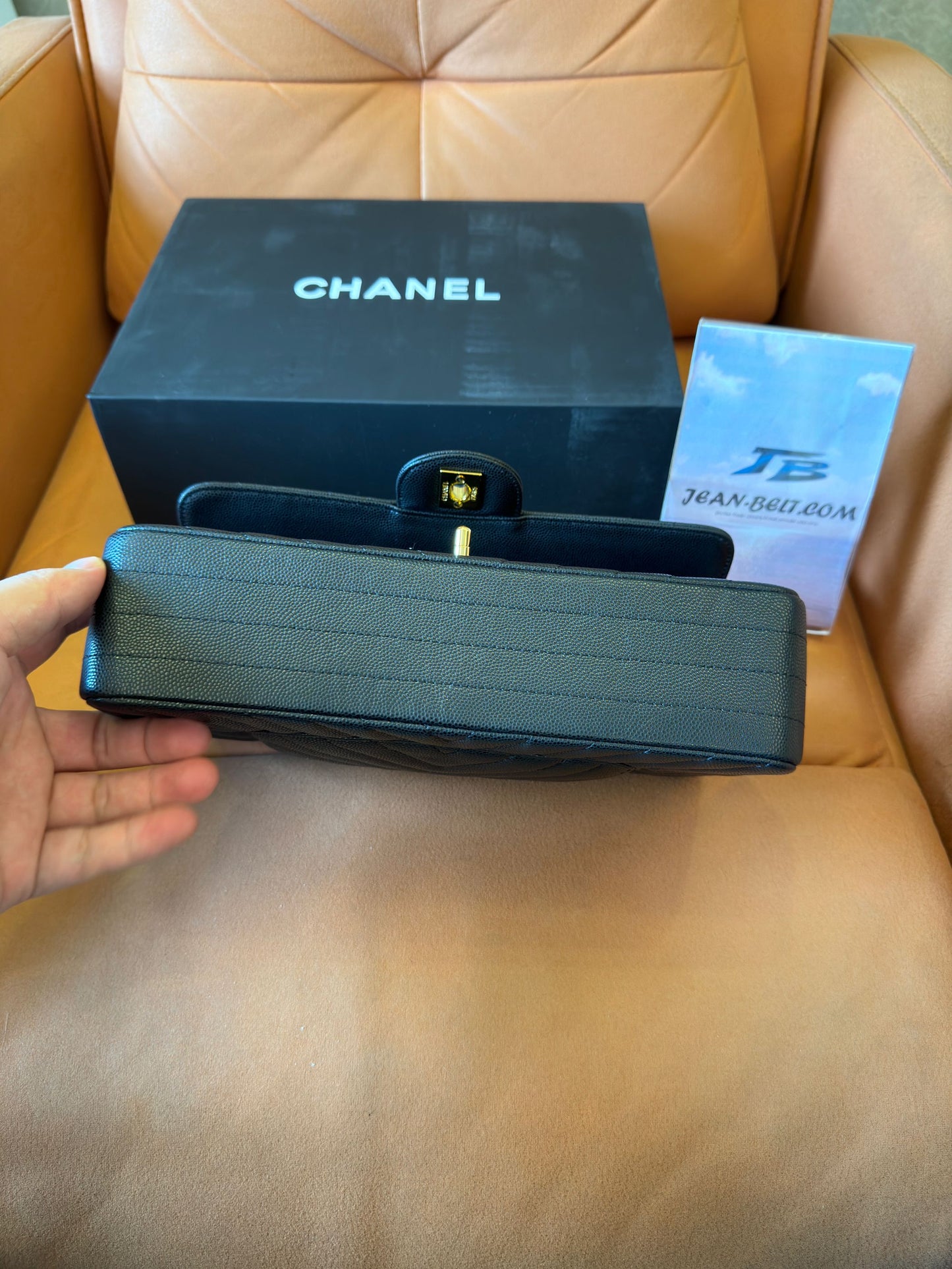 Chanel classic small black chevron caviar flap bag