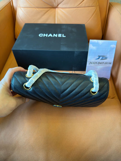 Chanel classic small black chevron caviar flap bag