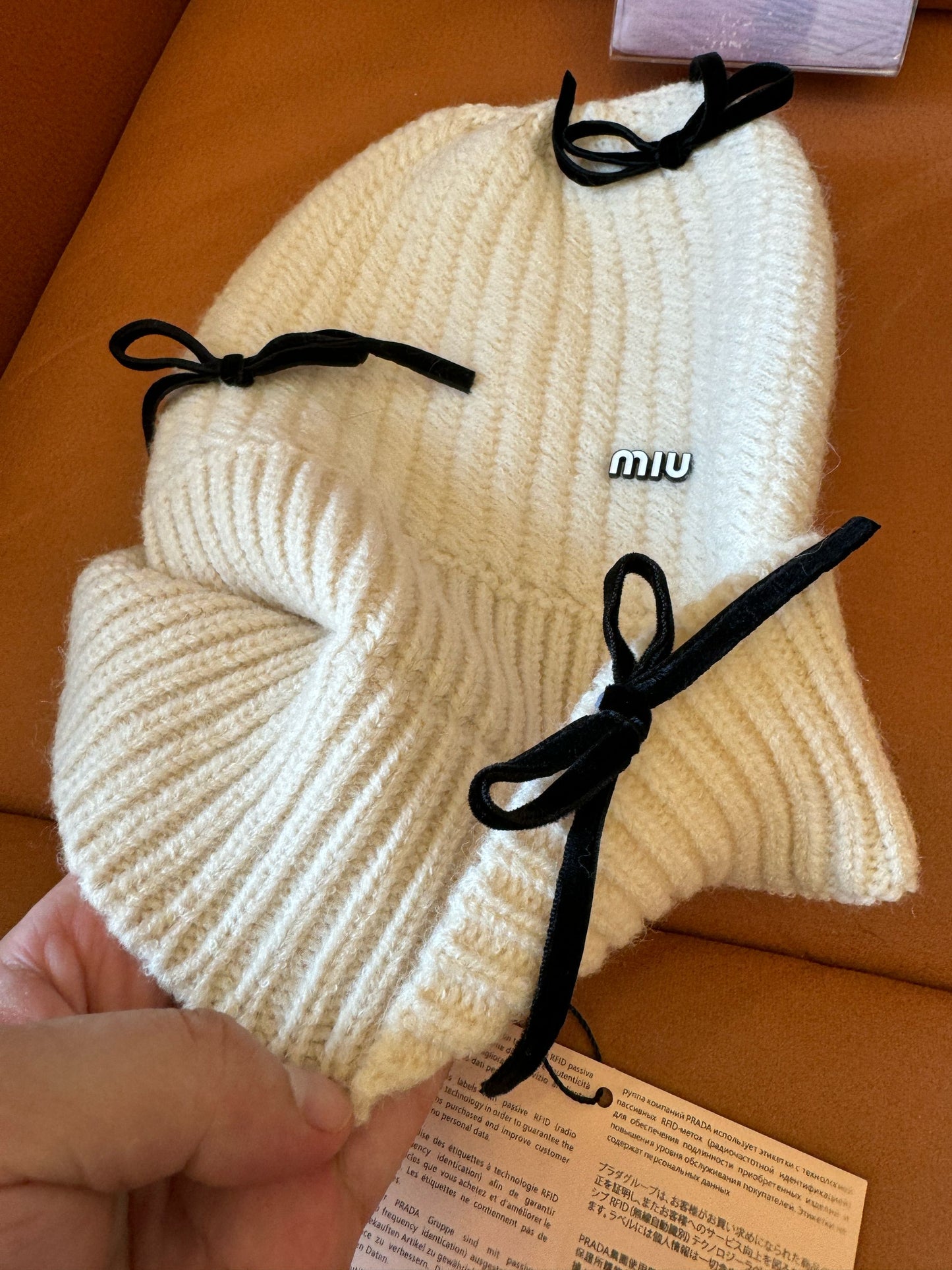 Miu Miu knitted wool beanie with bow details