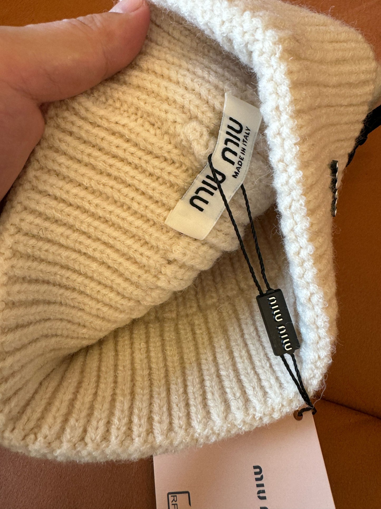 Miu Miu knitted wool beanie with bow details