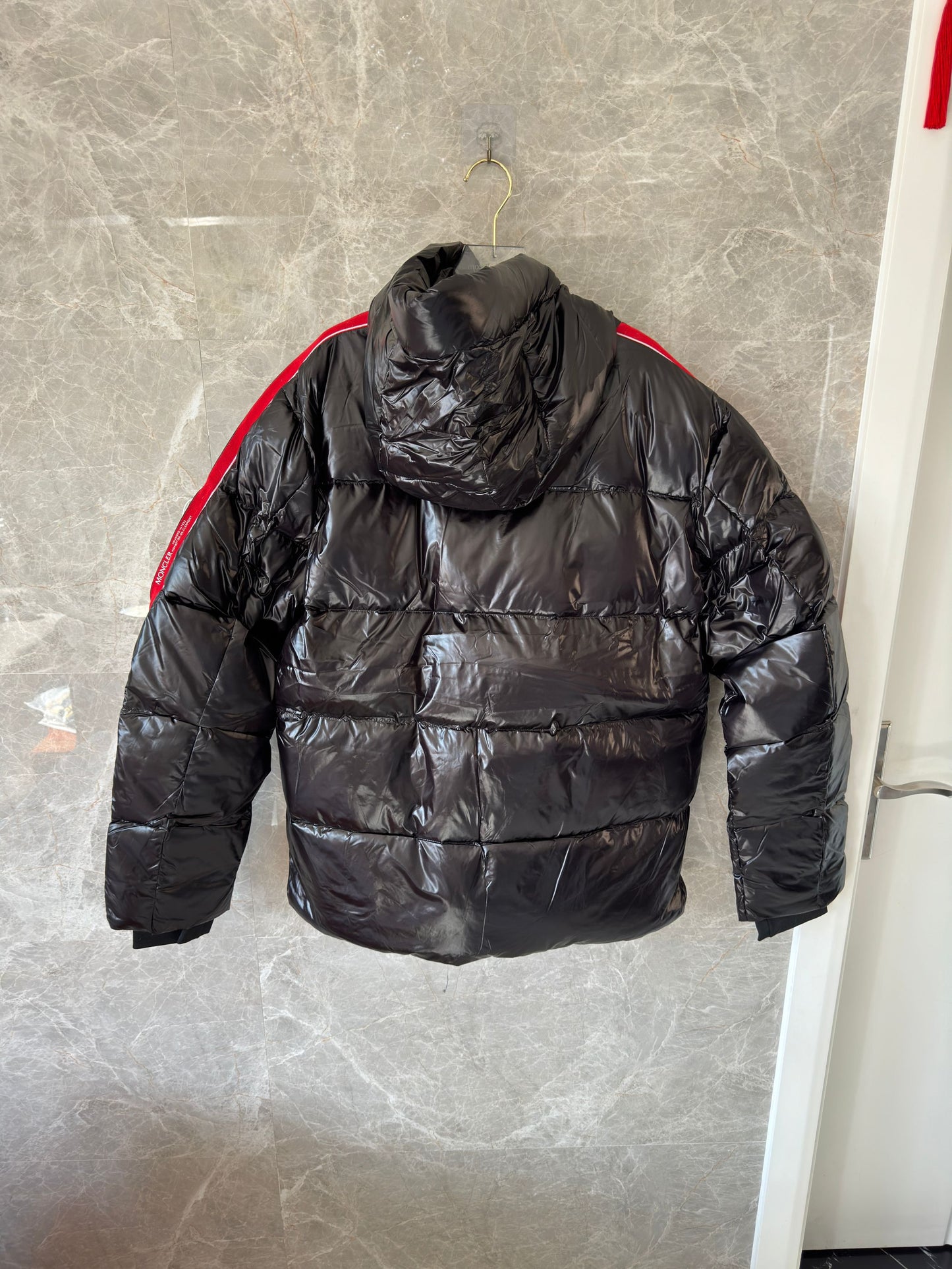 Moncler black glossy down puffer jacket with tri-color stripe detail