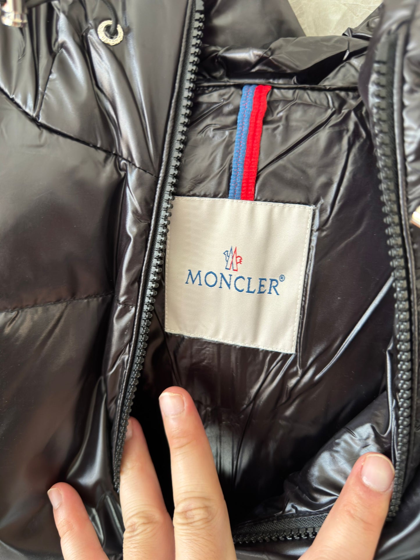 Moncler black glossy down puffer jacket with tri-color stripe detail