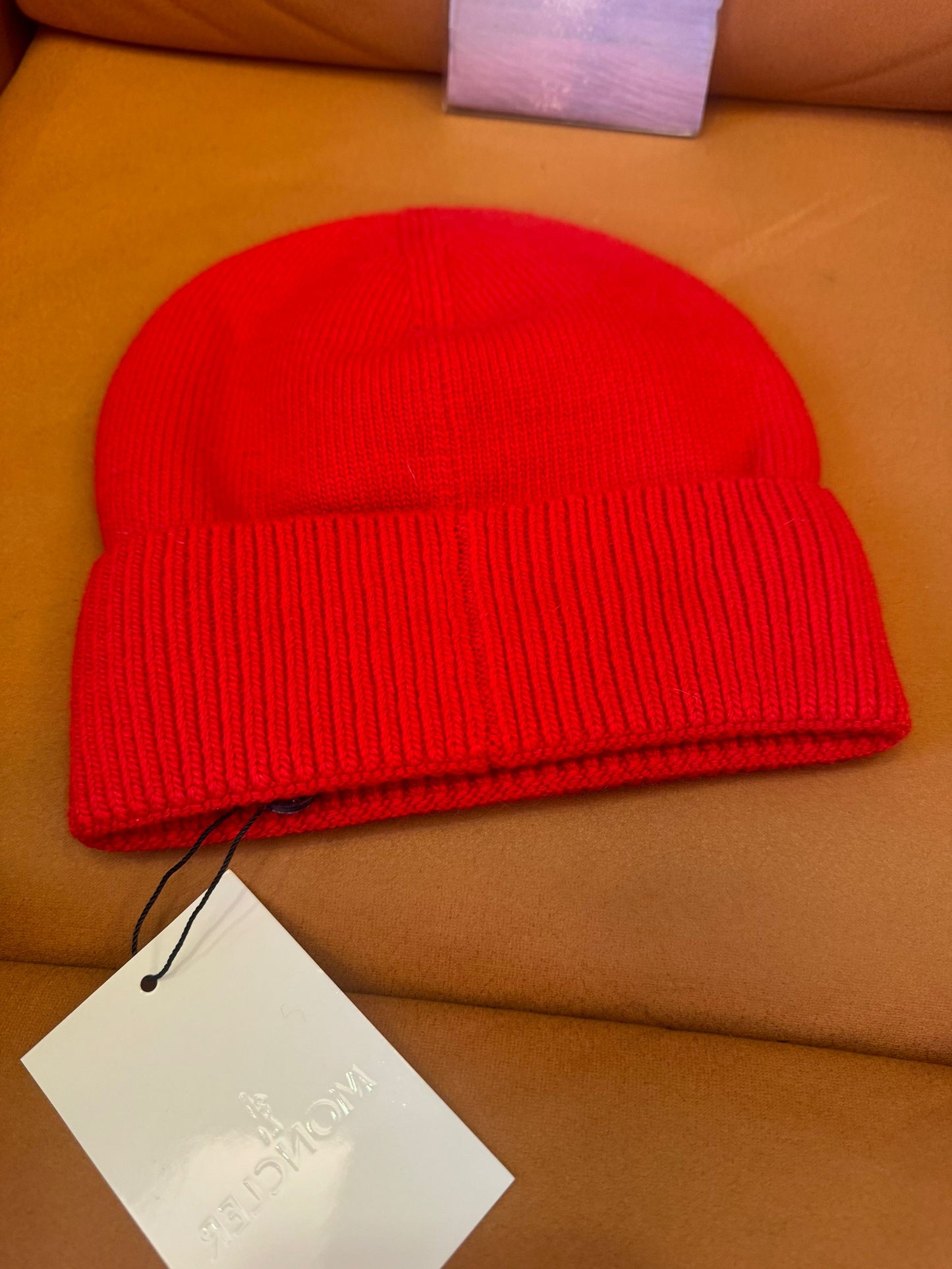 Moncler red wool beanie with iconic logo patch