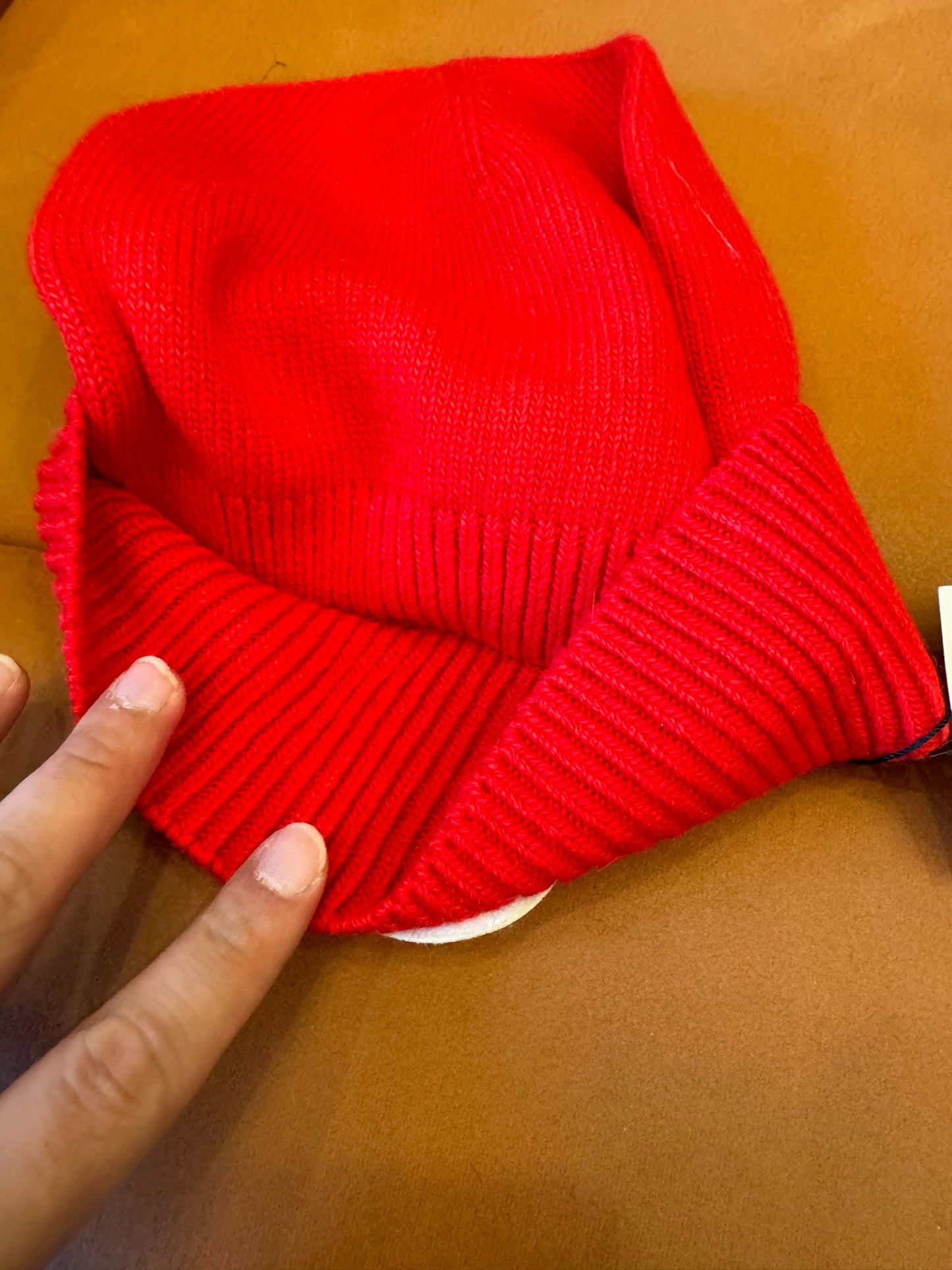 Moncler red wool beanie with iconic logo patch