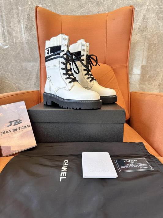 Chanel white combat boots with ribbed knit logo socks