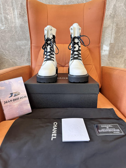 Chanel white combat boots with ribbed knit logo socks