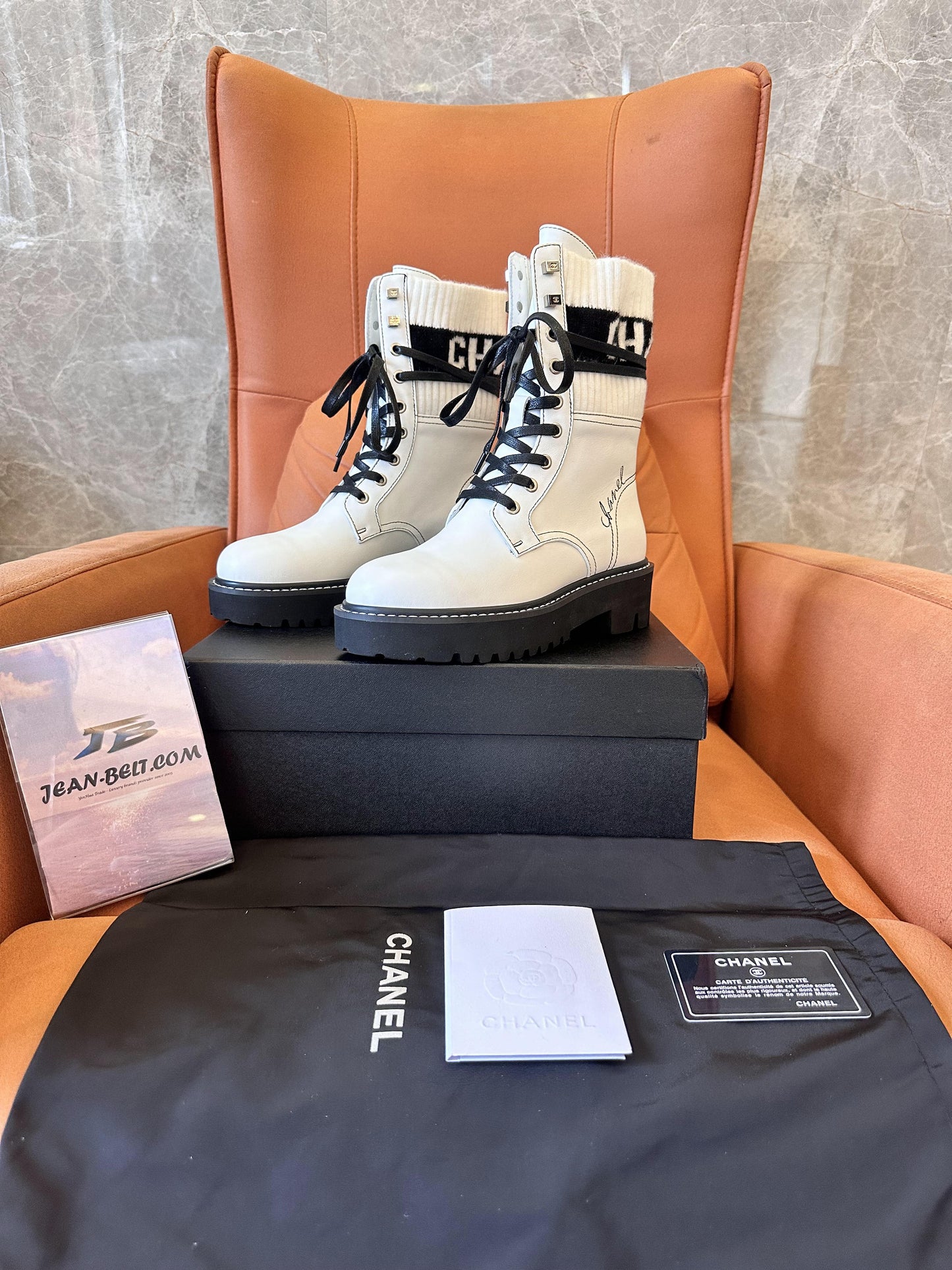 Chanel white combat boots with ribbed knit logo socks