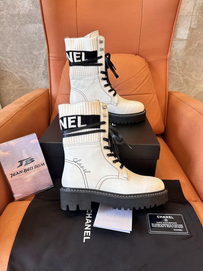 Chanel white combat boots with ribbed knit logo socks