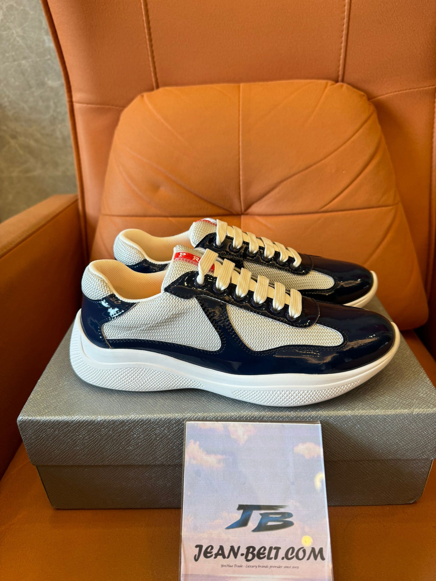 Prada men's navy and beige lace-up sneakers