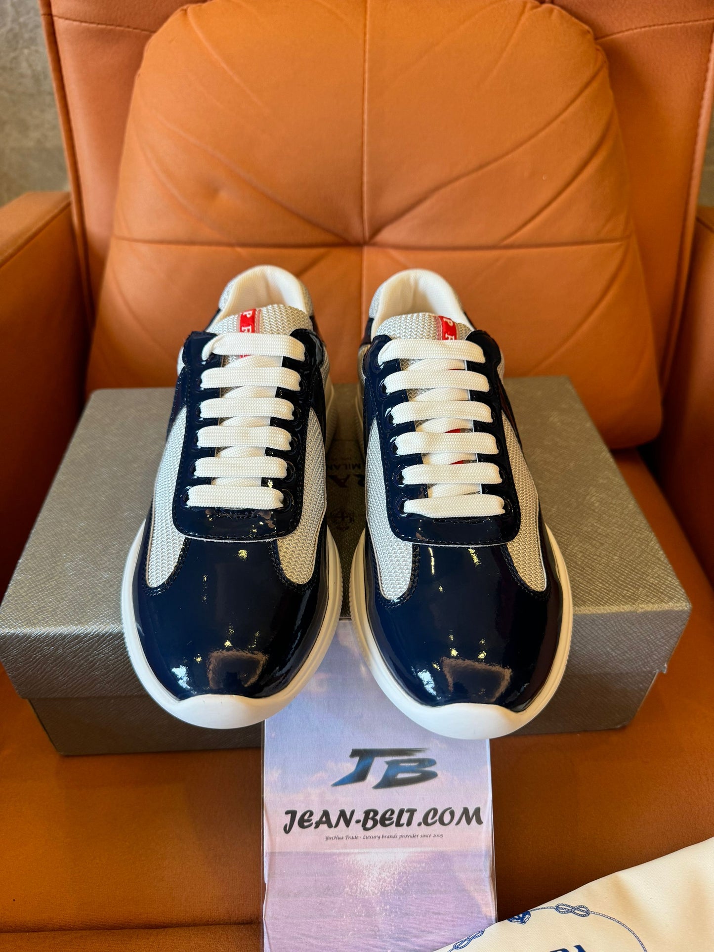 Prada men's navy and beige lace-up sneakers