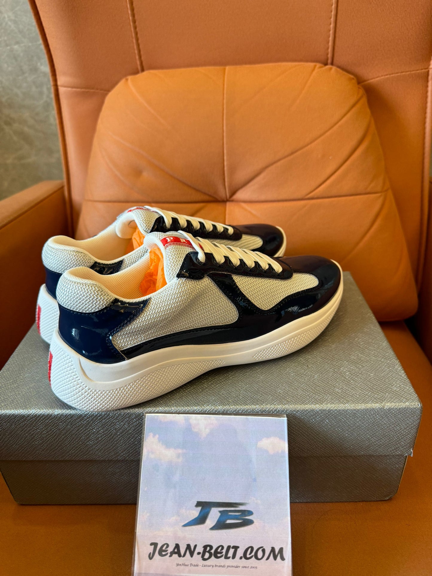 Prada men's navy and beige lace-up sneakers