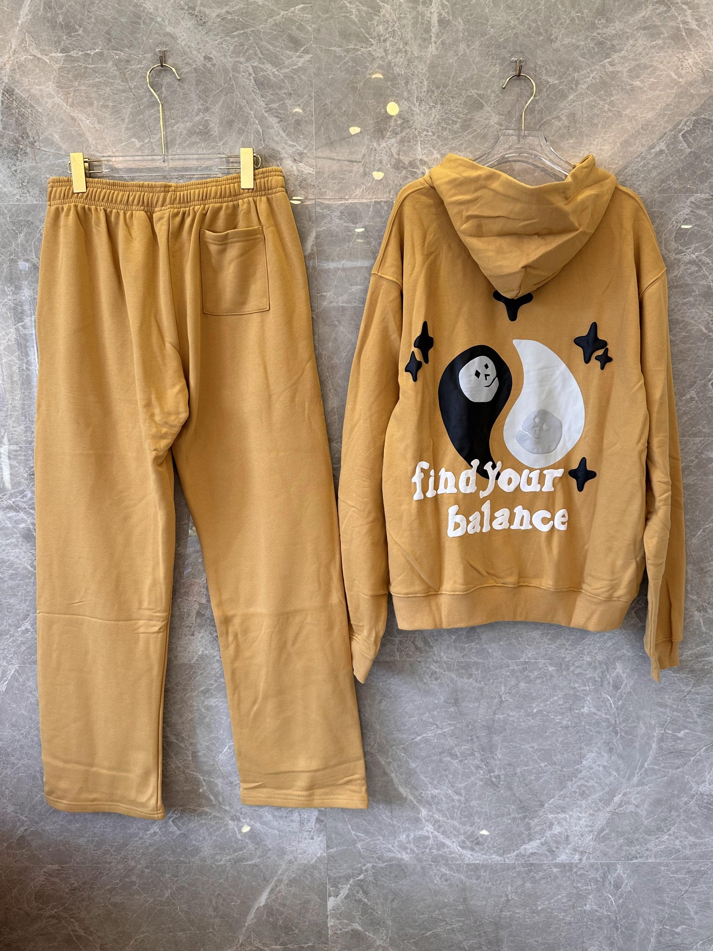 Broken Planet “So Much Chaos” hoodie and jogger set in caramel brown