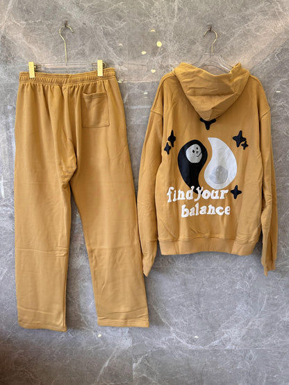 Broken Planet “So Much Chaos” hoodie and jogger set in caramel brown