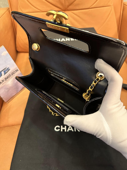 Chanel mini flap bag with top handle