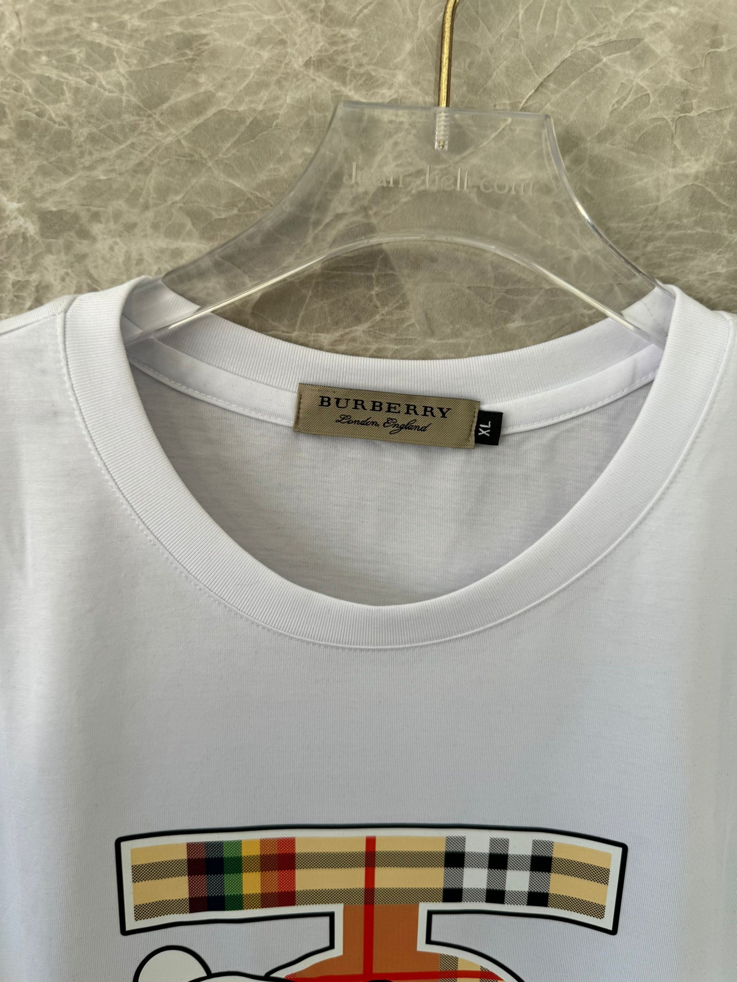 Burberry white t-shirt with iconic equestrian knight and check plaid accent