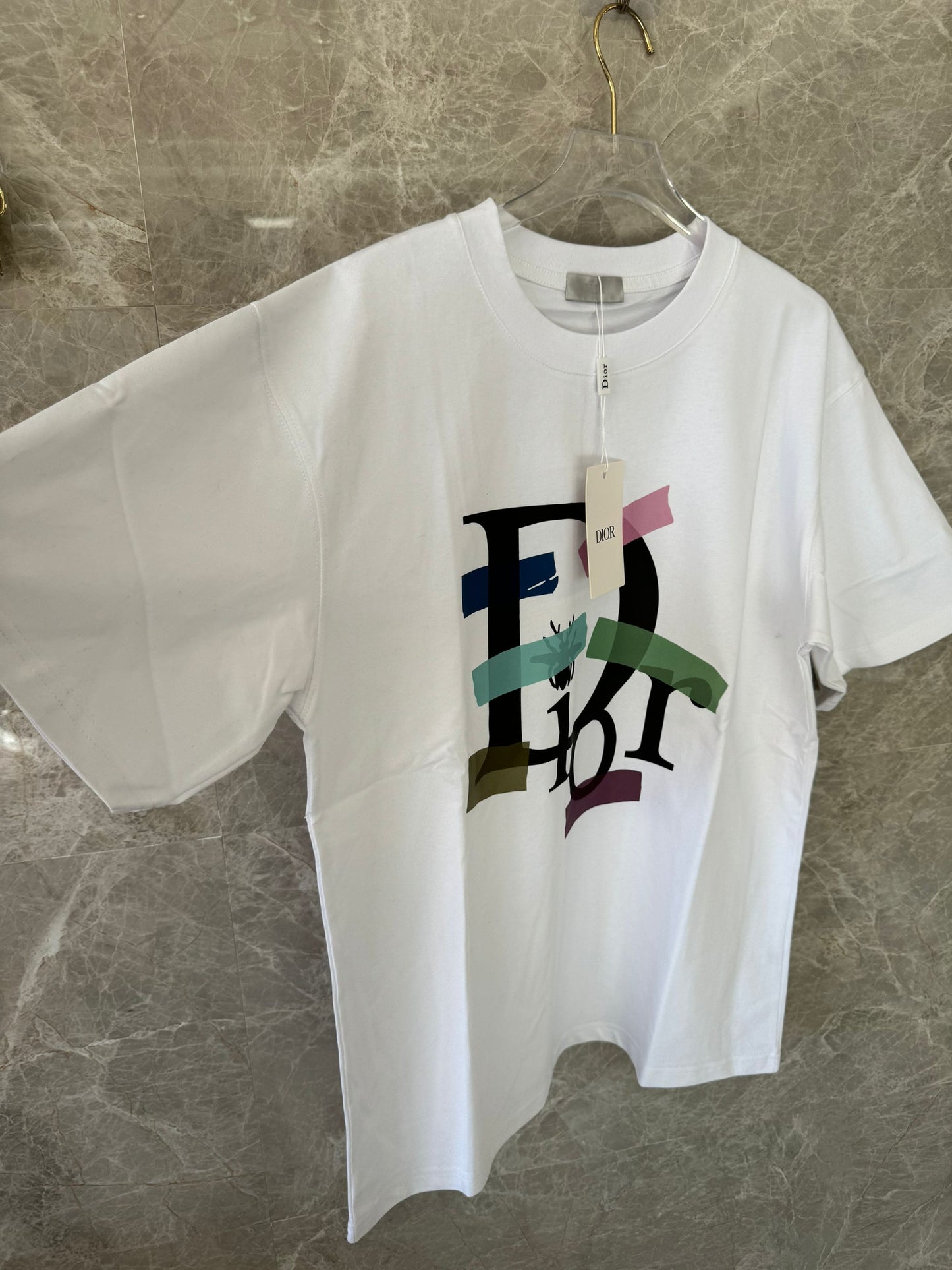 Dior white t-shirt with multicolored artistic logo