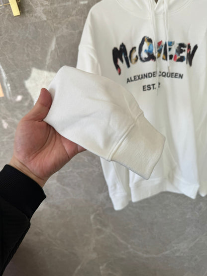 Alexander McQueen white distressed logo hoodie with color accents