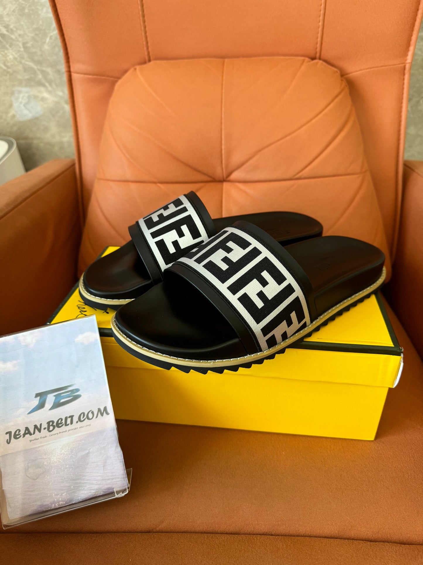 Fendi FF slide sandals in black and white