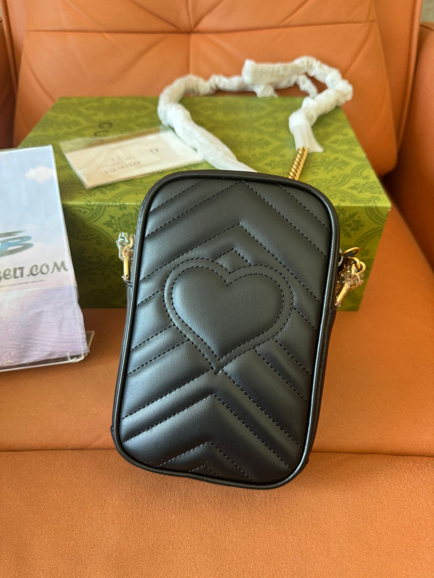 Gucci mini quilted leather crossbody Phone bag