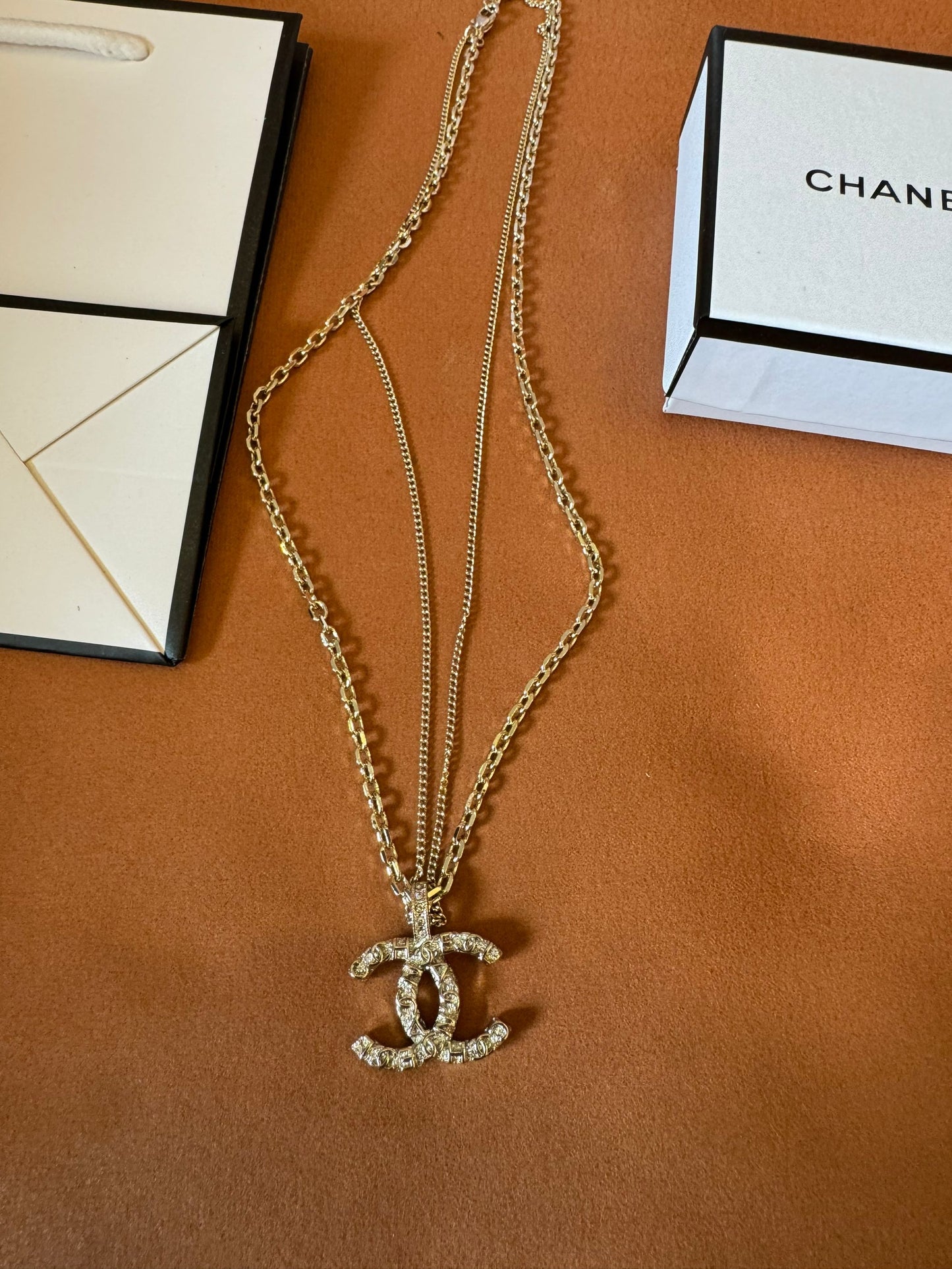 Chanel crystal logo earrings, necklace, and bracelet set