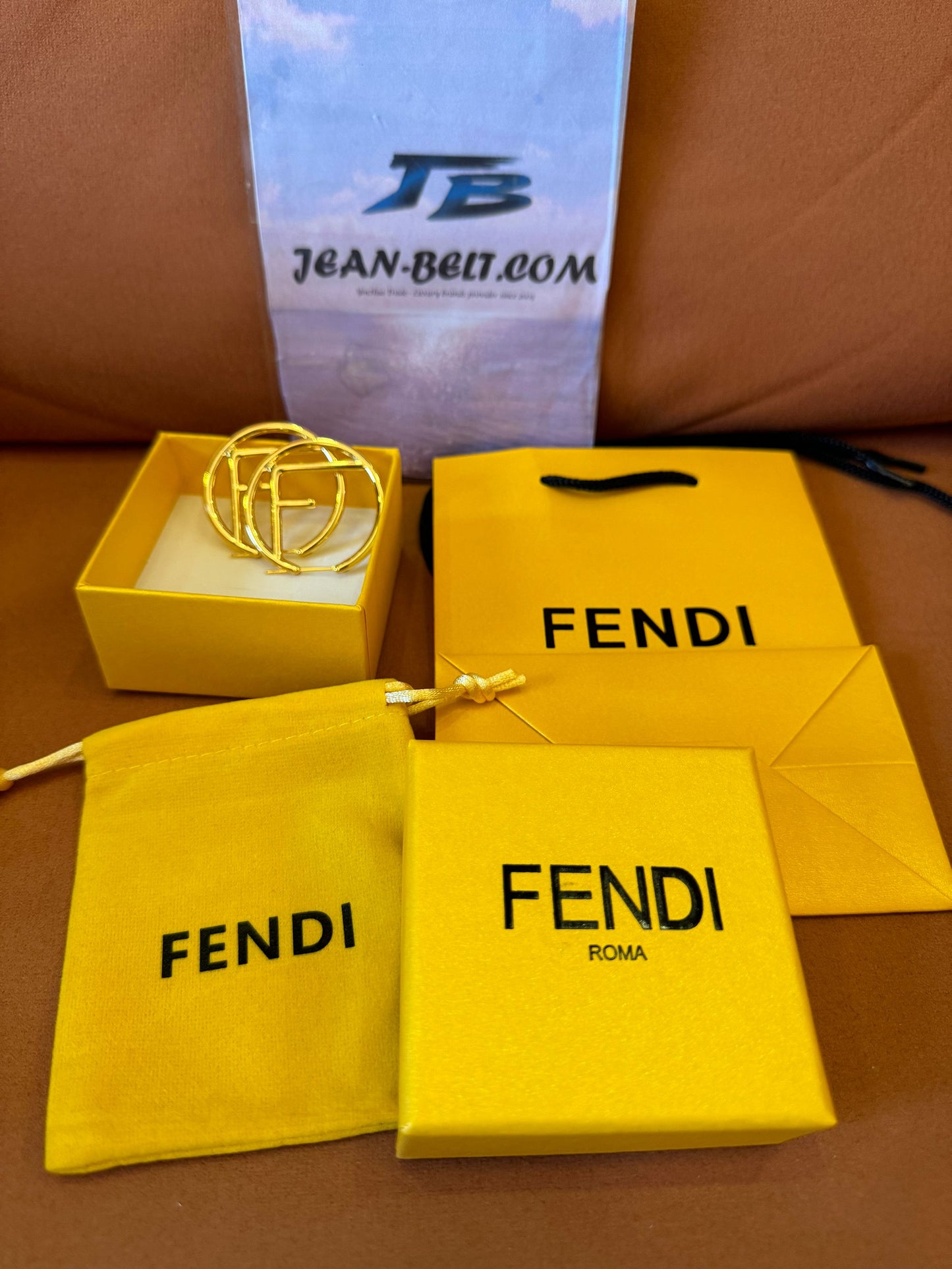 Fendi logo hoop earrings in gold-tone