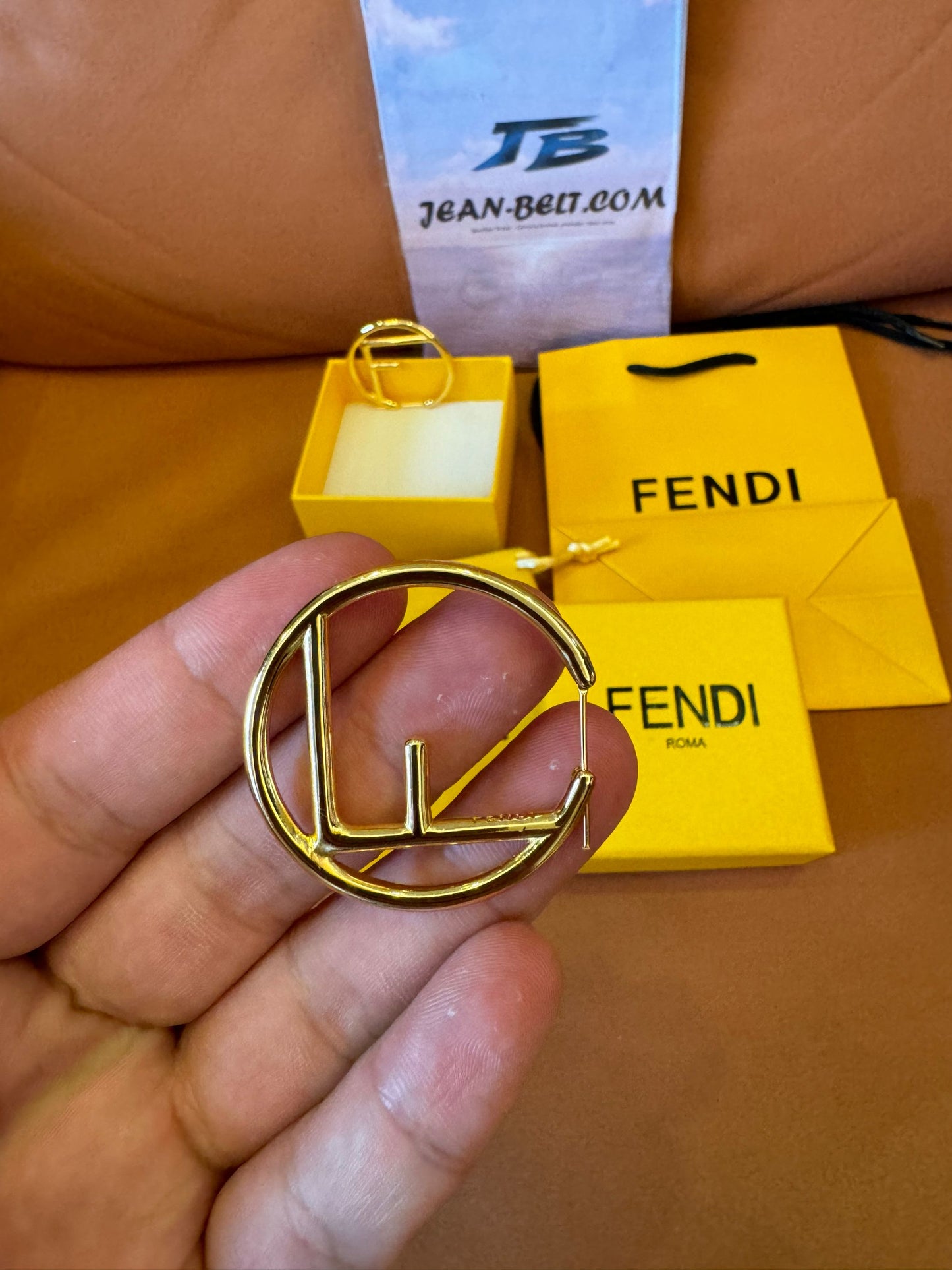 Fendi logo hoop earrings in gold-tone