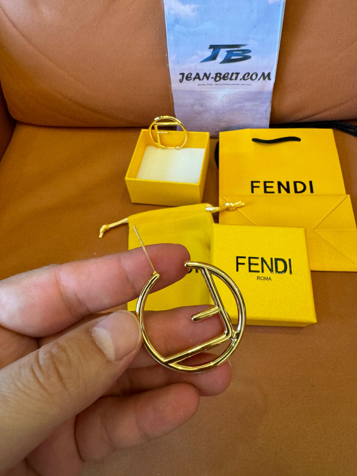 Fendi logo hoop earrings in gold-tone