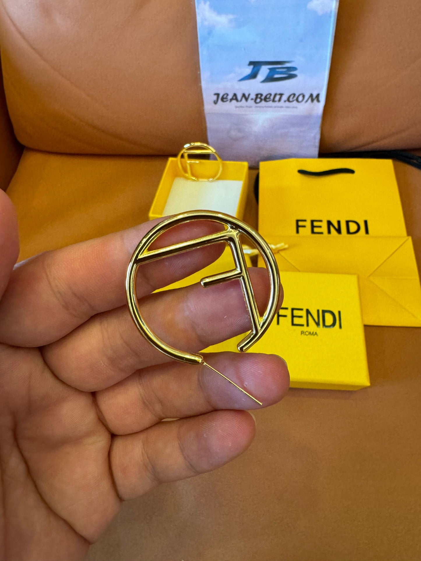 Fendi logo hoop earrings in gold-tone