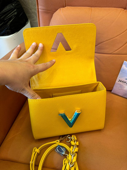 Louis Vuitton twist pm epi yellow shoulder and crossbody bags