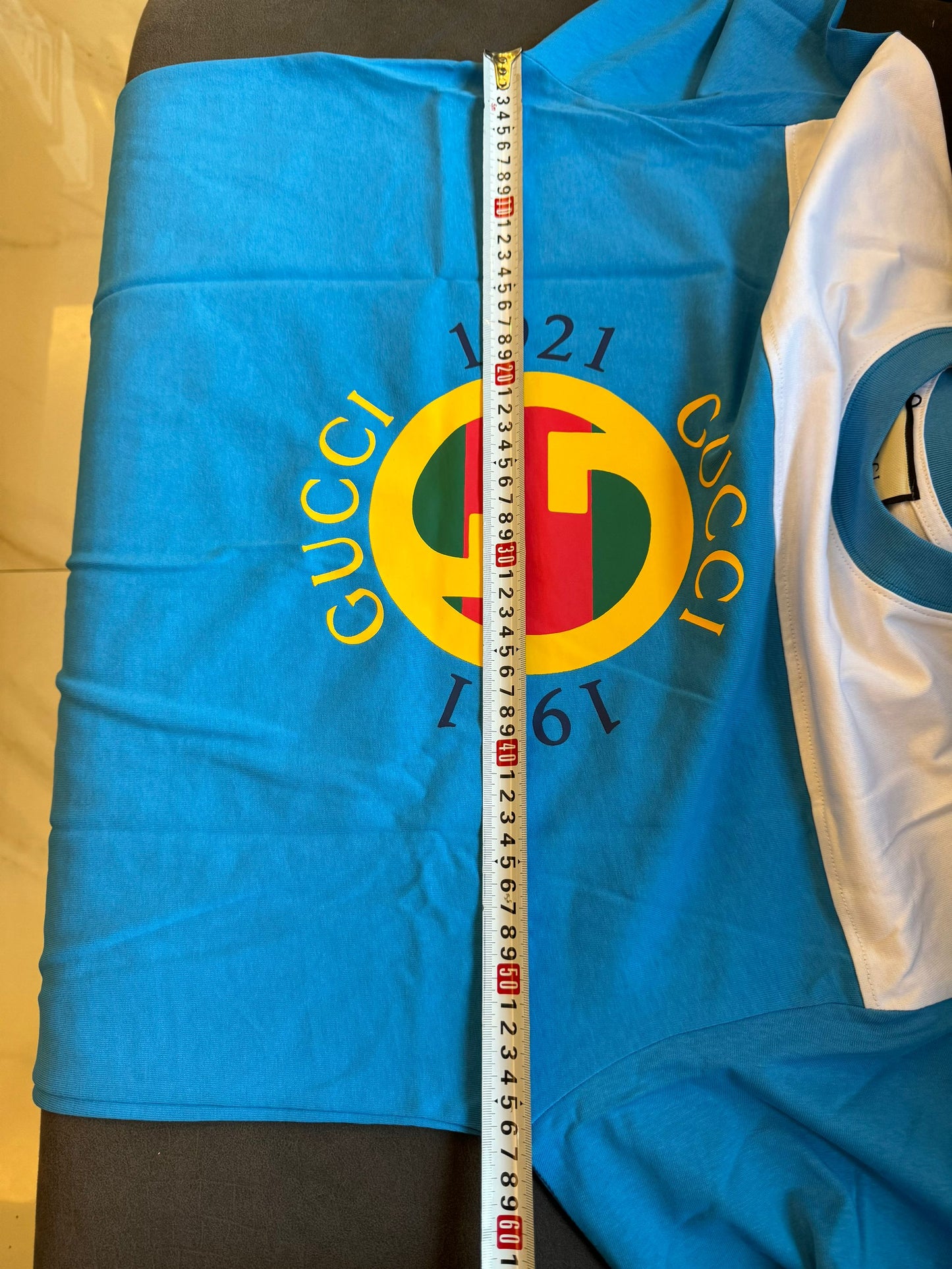 Gucci 1921 logo cotton t-shirt in blue and white