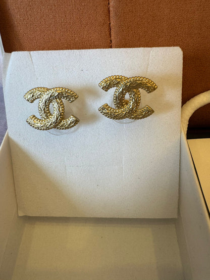 Chanel vintage gold-tone cursive logo earrings