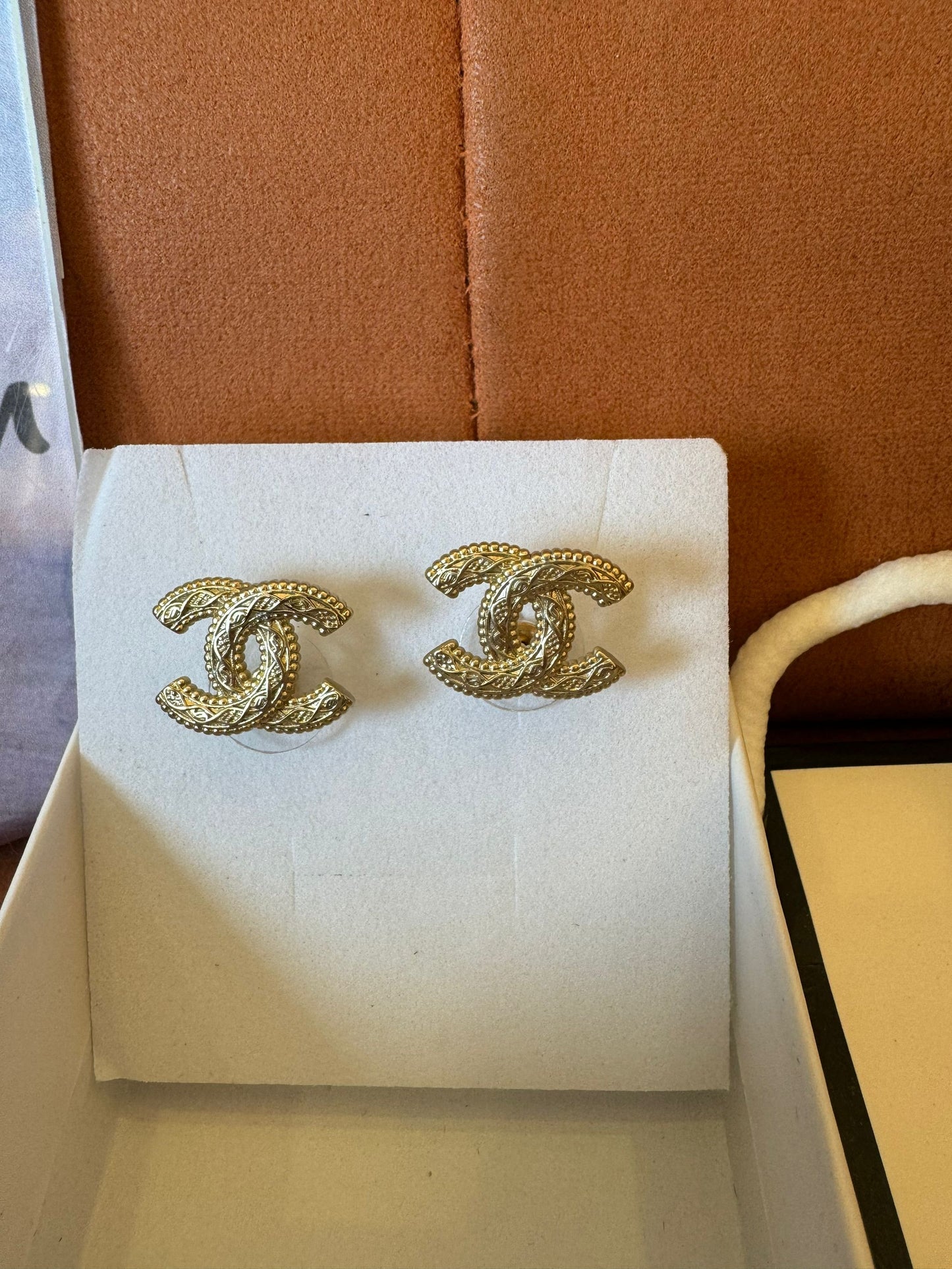 Chanel vintage gold-tone cursive logo earrings