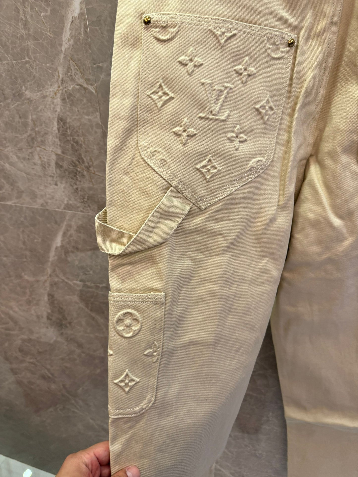 Louis Vuitton beige embossed monogram denim pants