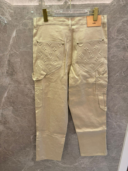 Louis Vuitton beige embossed monogram denim pants