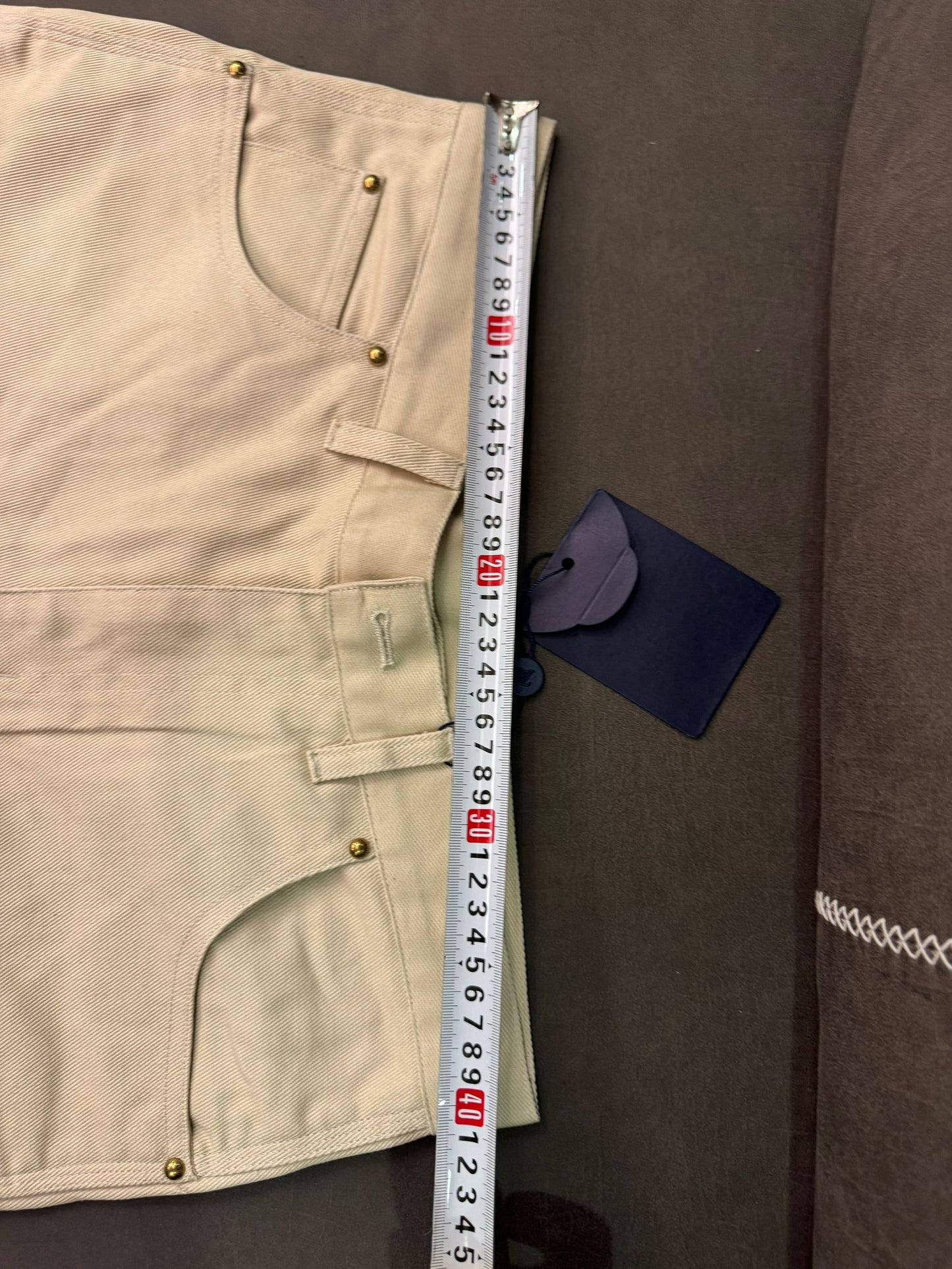 Louis Vuitton beige embossed monogram denim pants